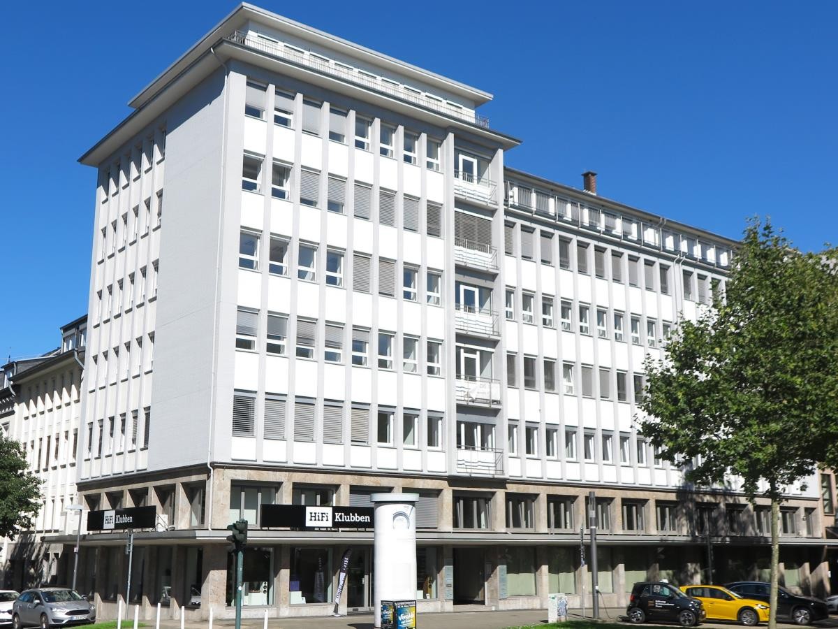 Titelbild - Modernisiertes Bürogebäude mit attraktiver Natursteinfassade!